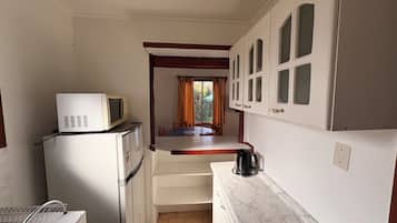 Junior Cabin, 2 Bedrooms, Lake View | Private kitchen | Fridge, microwave, cookware/dishes/utensils
