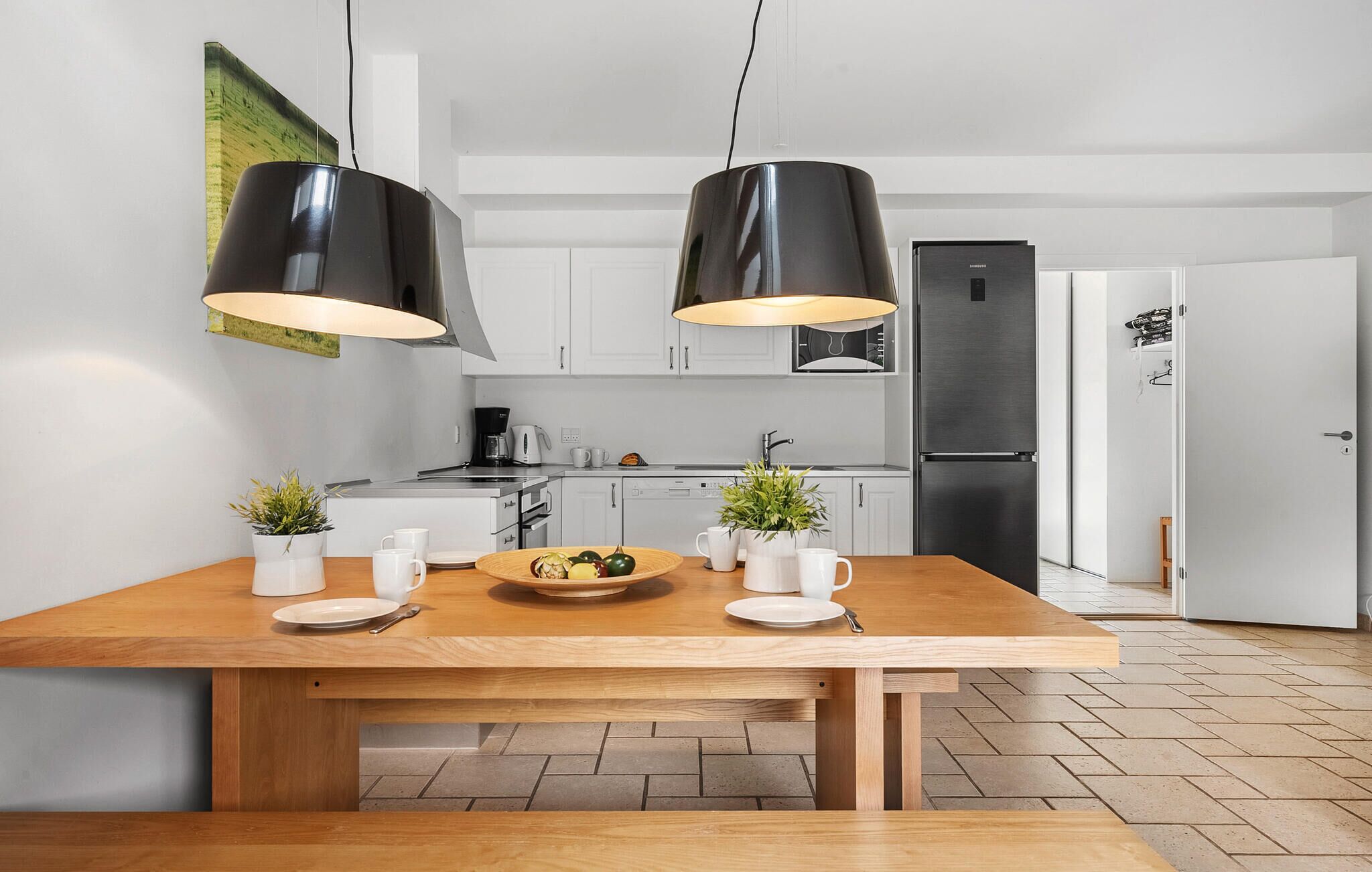 Fridge, stovetop, dishwasher, coffee/tea maker