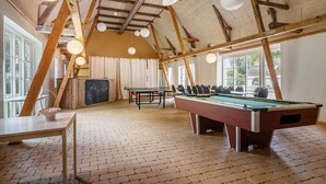 A billiards room with a pool table, chairs, and a table tennis table. - Lovely home in Nimtofte with WiFi (Nimtofte)