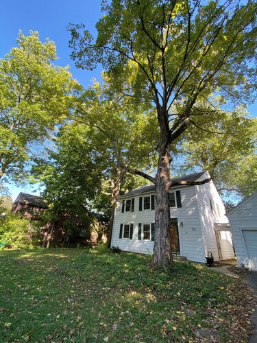 Family-friendly home, beautiful fenced-in yard, short walk to Ball State Campus