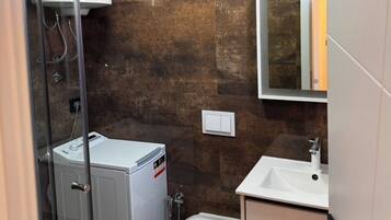 Hair dryer, towels, soap, toilet paper