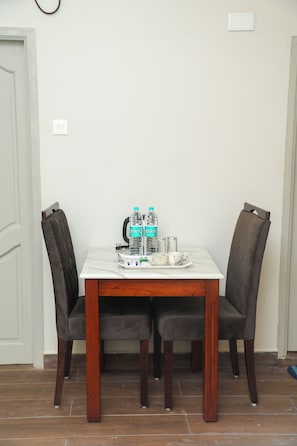 Honeymoon Double Room, City View | In-room dining