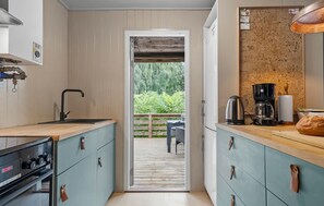 Fridge, stovetop, coffee/tea maker