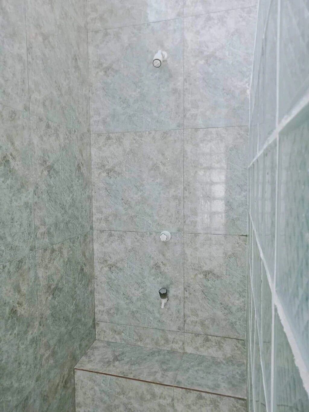 Shower, eco-friendly toiletries, towels, soap