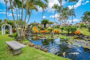 Property grounds - Oceanfront condo with pool, hot tub, sauna, tennis, BBQ, putting green, & lanai (Kapaa)