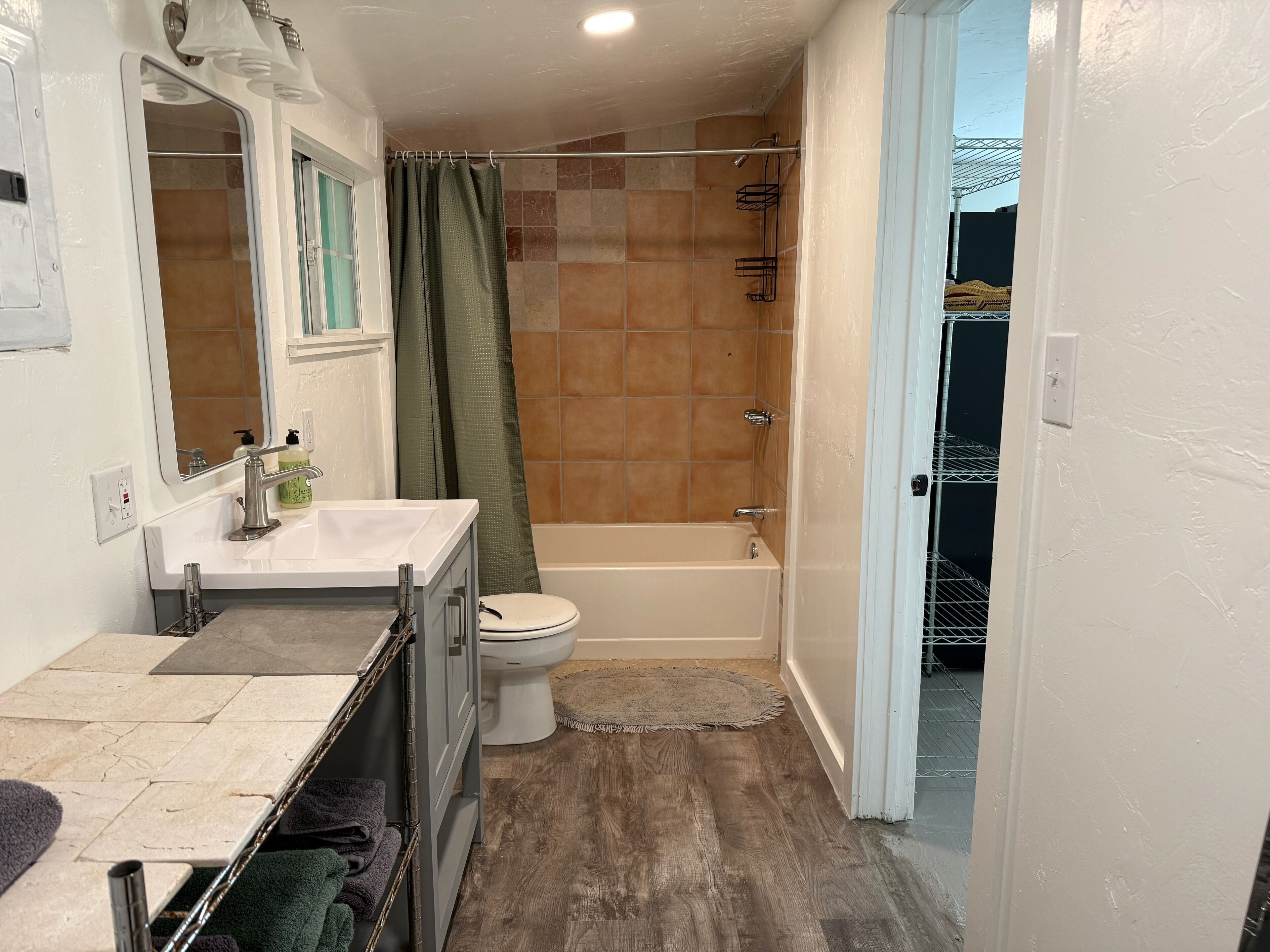 Hair dryer, towels, soap, toilet paper