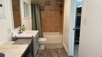 Hair dryer, towels, soap, toilet paper