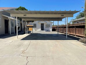 Exterior - Vibrant & modern Coalinga home perfect for families or work trips! Enjoy a fully equipped kitchen, dedicated workspace with blazing-fast Wi-Fi, and a private patio. Walk to local shops & restaurants. (Coalinga)