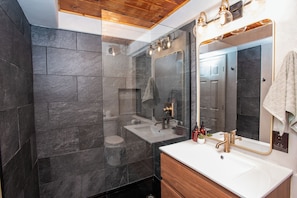 Shower, hair dryer, towels, soap