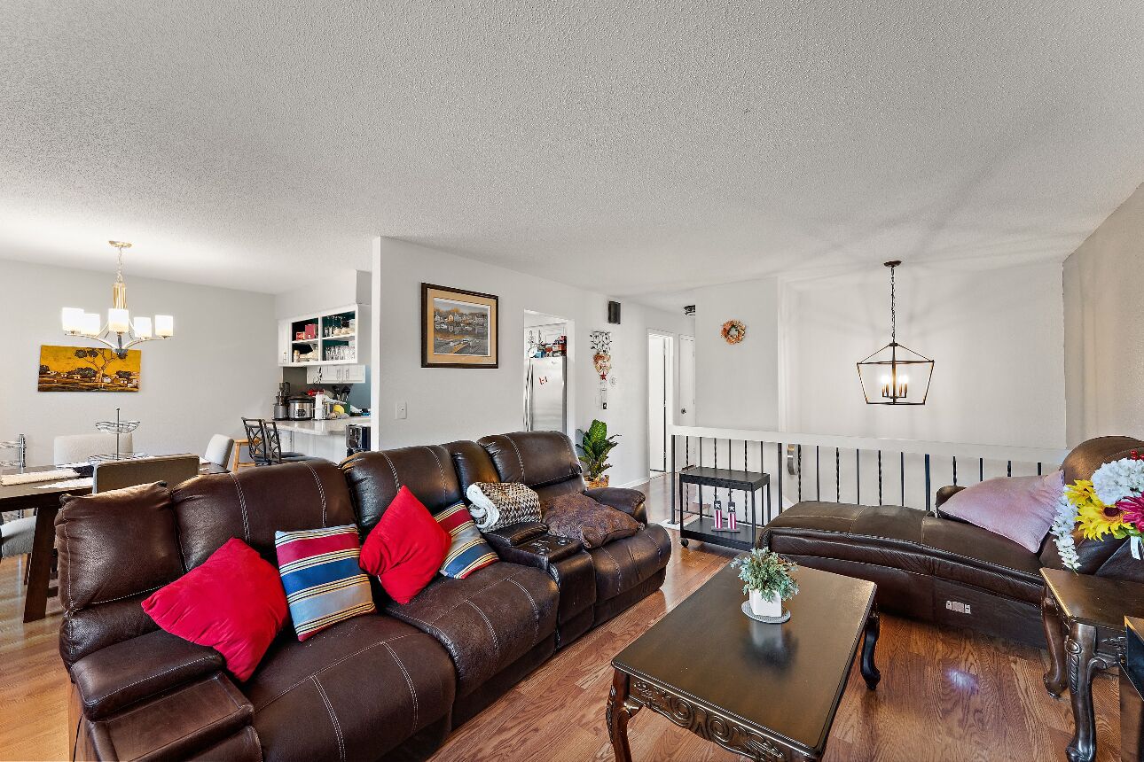 Smart TV, fireplace, books, computer monitors