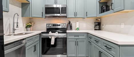 Fridge, microwave, dishwasher, coffee/tea maker