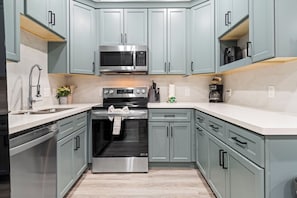Fridge, microwave, dishwasher, coffee/tea maker