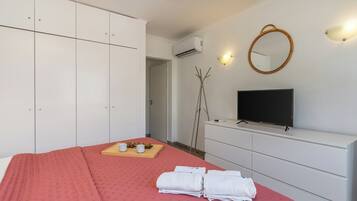 2 slaapkamers, een strijkplank/strijkijzer, gratis wifi, beddengoed