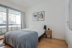1 habitación, tabla de planchar con plancha, wifi y ropa de cama 