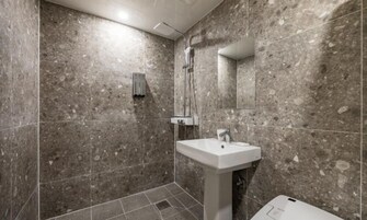Artículos de tocador gratuitos, secador de pelo, pantuflas, bidet