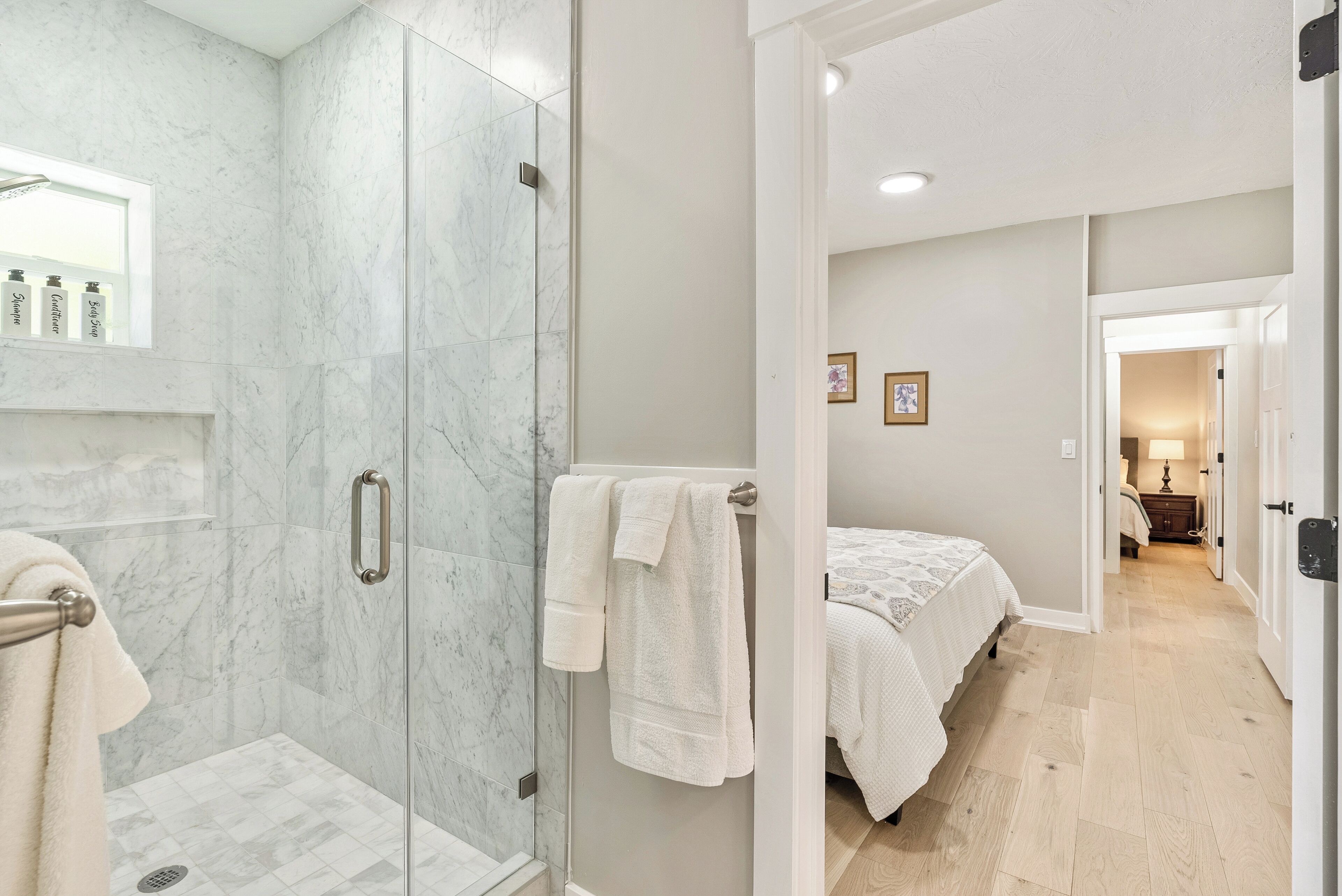 Shower, hair dryer, towels, soap