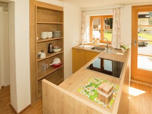 Fridge, dishwasher, cookware/dishes/utensils