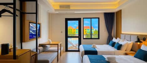 Elite Quadruple Room, 2 Double Beds, Pool View | Down duvets, in-room safe, desk, blackout curtains