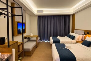 Elite Quadruple Room, 2 Double Beds | Down comforters, in-room safe, desk, blackout drapes - Revery Hotel Siem Reap (Siem Reap)