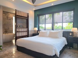 Deluxe Double Room, River View | Minibar, in-room safe, desk, laptop workspace