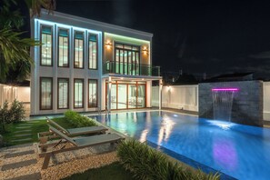 A modern two-story house with a swimming pool, a balcony, and a waterfall feature. - Built17122024Great Villa Beautiful V154 (Chalong)