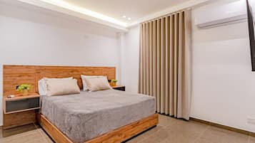 Cortinas blackout, tabla de planchar con plancha y wifi gratis