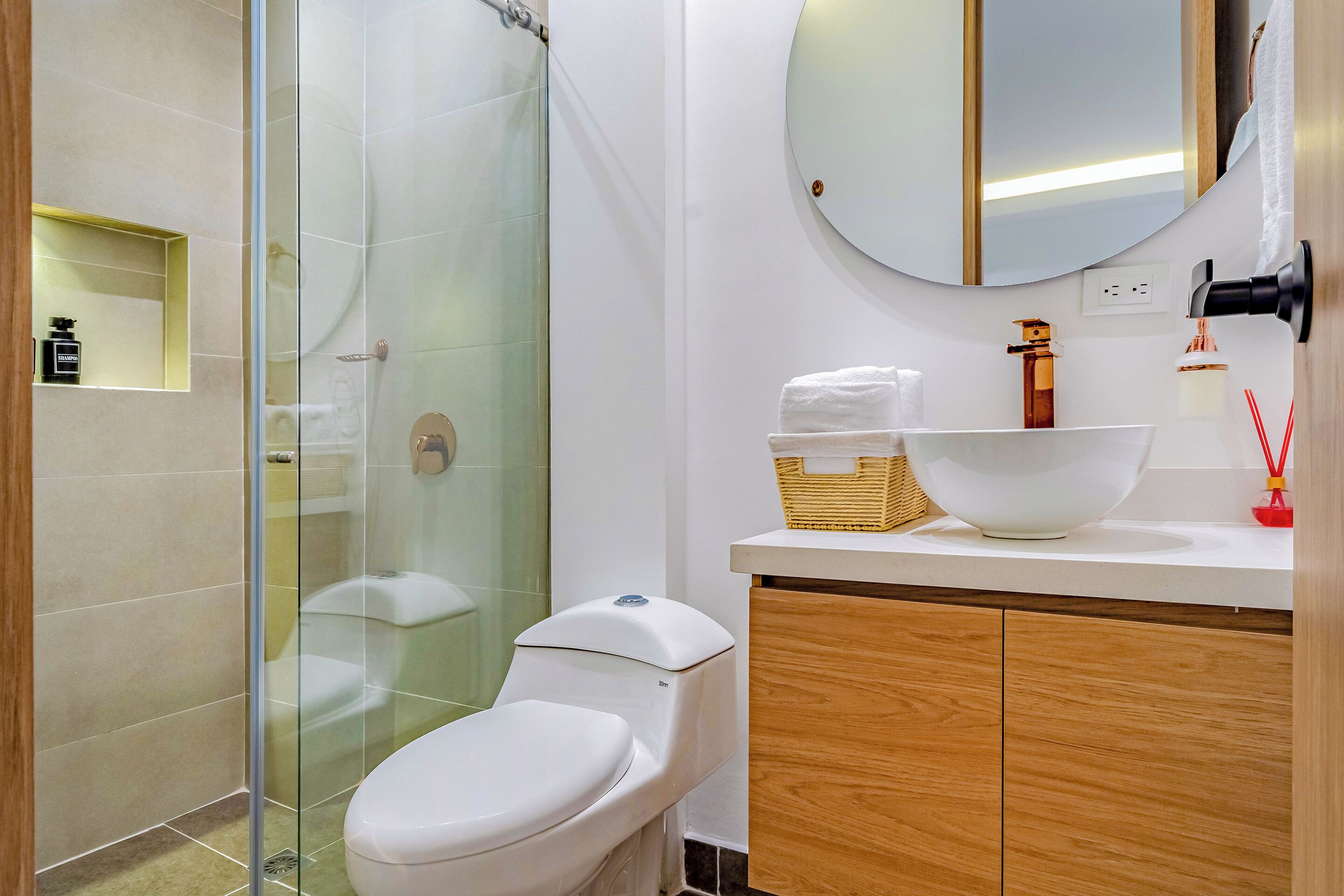 Shower, rainfall showerhead, hair dryer, towels