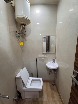 Shower, towels, soap, toilet paper
