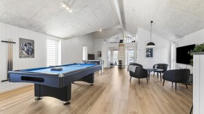 A spacious indoor area with a pool table, seating, and a television. - VillaVilla 824 - Fjellerup, Østjylland (Glesborg)