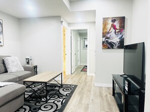 TV - Cozy and comfy  1-Bedroom, living room and kitchen for relaxation. (Calgary)