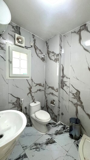 Standard Apartment, 2 Bedrooms | Bathroom | Shower, bidet, towels, soap - Al Bayrahaa Checkmyguest Muscat  (Seeb)