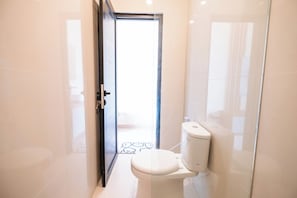 Habitació Deluxe | Bany | Dutxa i tovalloles
