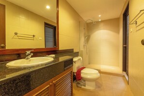 A bathroom with a sink, toilet, and shower. - MassiveHugePool9MinutesWalk to BeachV131 (Choeng Thale)