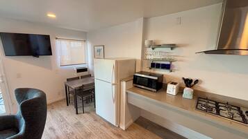 Fridge, microwave, coffee/tea maker, toaster