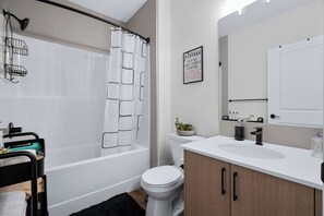 Hair dryer, towels, soap, shampoo