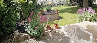 Large house in Provence village of Entressen with enclosed garden planted with trees, quiet location