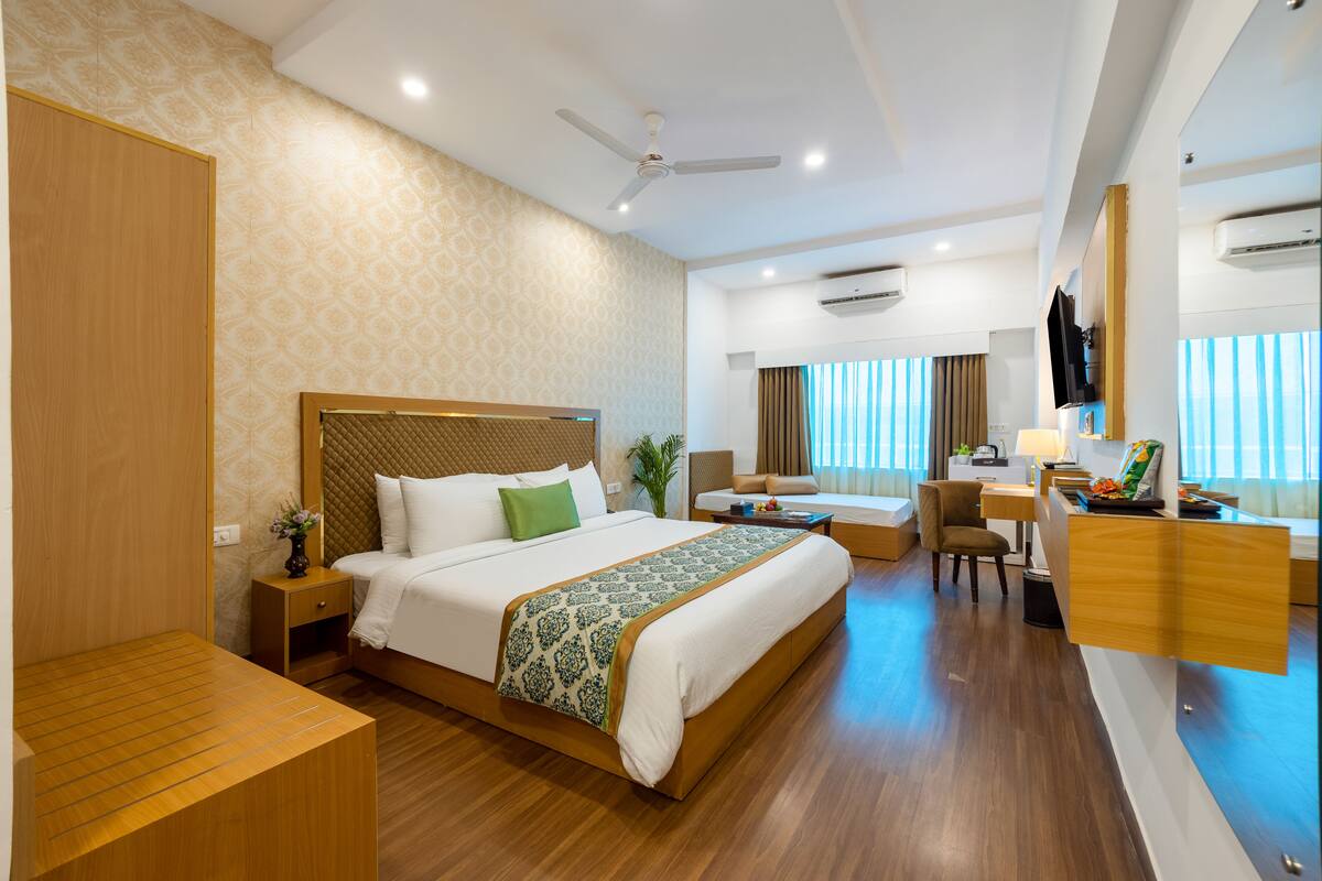 Premium Double Room | Living area | 32-inch LED TV with digital channels
