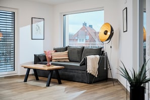 Superior-þakíbúð - 2 svefnherbergi - verönd | Stofa | Hituð gólf