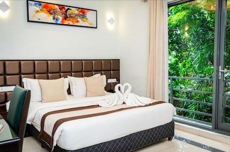 Deluxe Double Room, Balcony | In-room safe, iron/ironing board, free WiFi