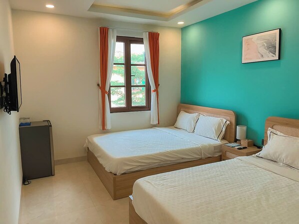 Family Quadruple Room, City View | Free WiFi