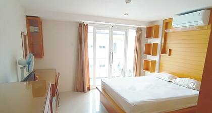 Harris Hotel & Residences Riverview Kuta - Studio Room Apartment w/ Pool View