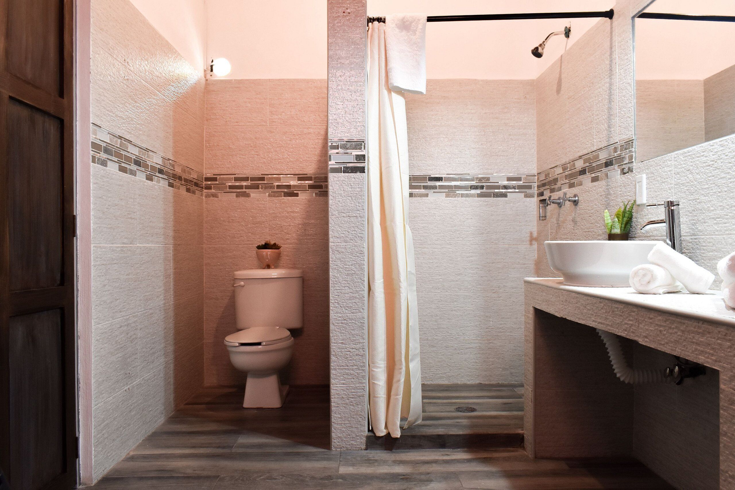 Superior Suite | Bathroom | Shower, hair dryer, towels, soap
