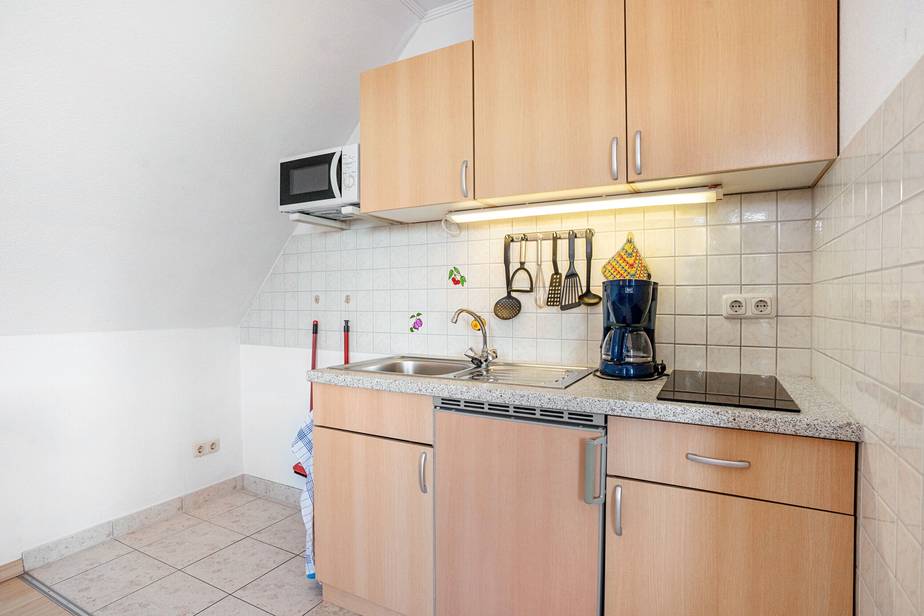 Een koelkast, een magnetron, een kookplaat