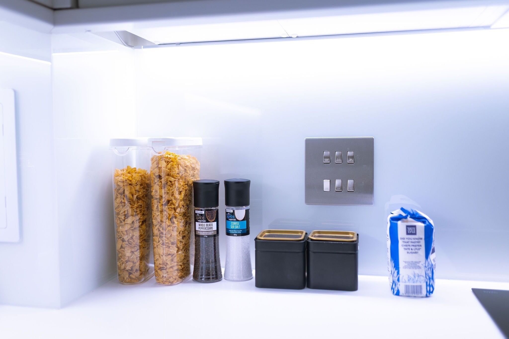 A refrigerator stocked with food items and condiments.