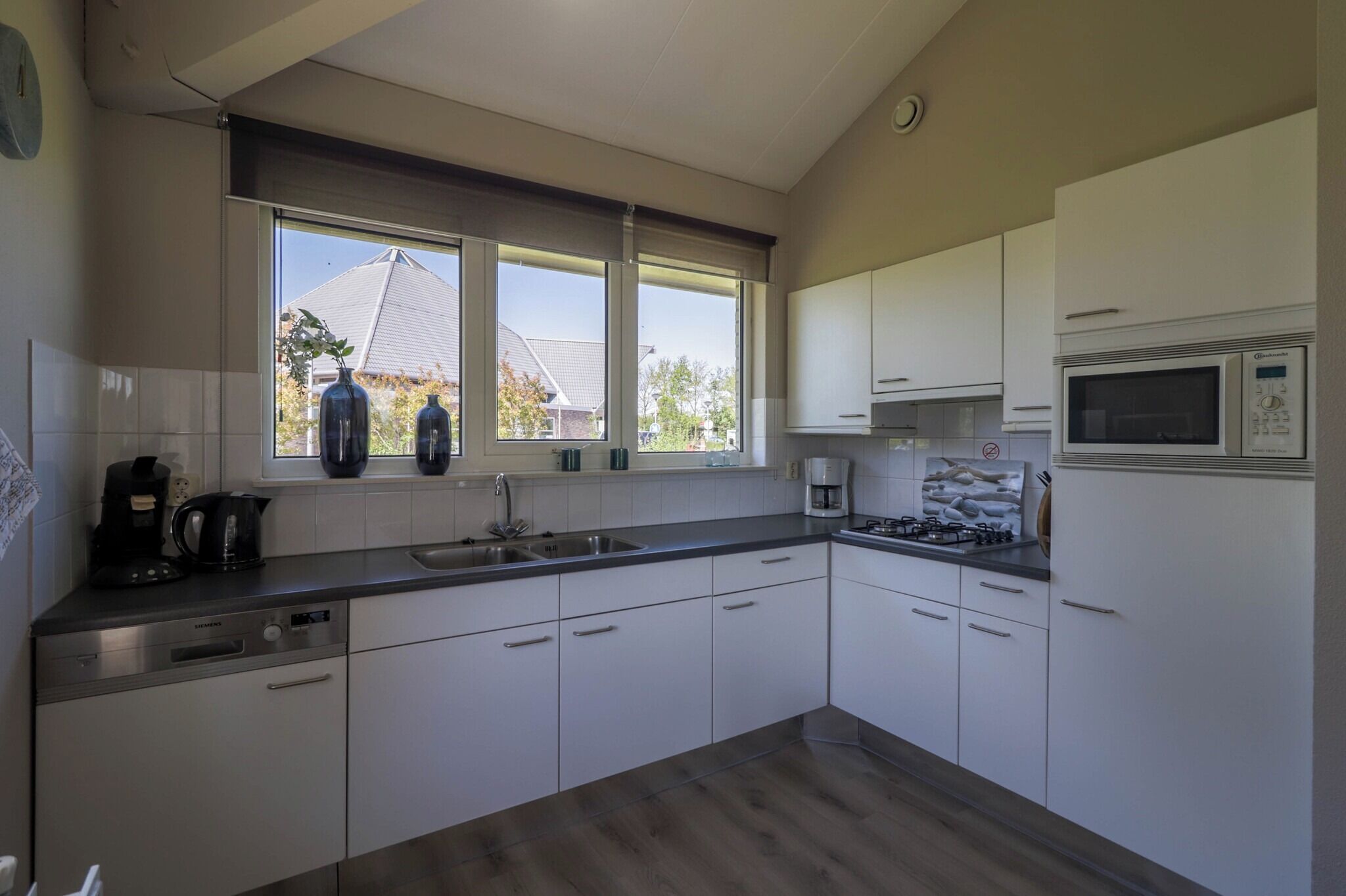 Fridge, microwave, dishwasher, coffee/tea maker