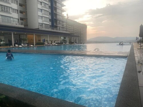 Chic 2-bedroom apartment with AC and fitness room in vibrant Kajang