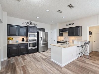 Allen Oasis • Game Room & Yard