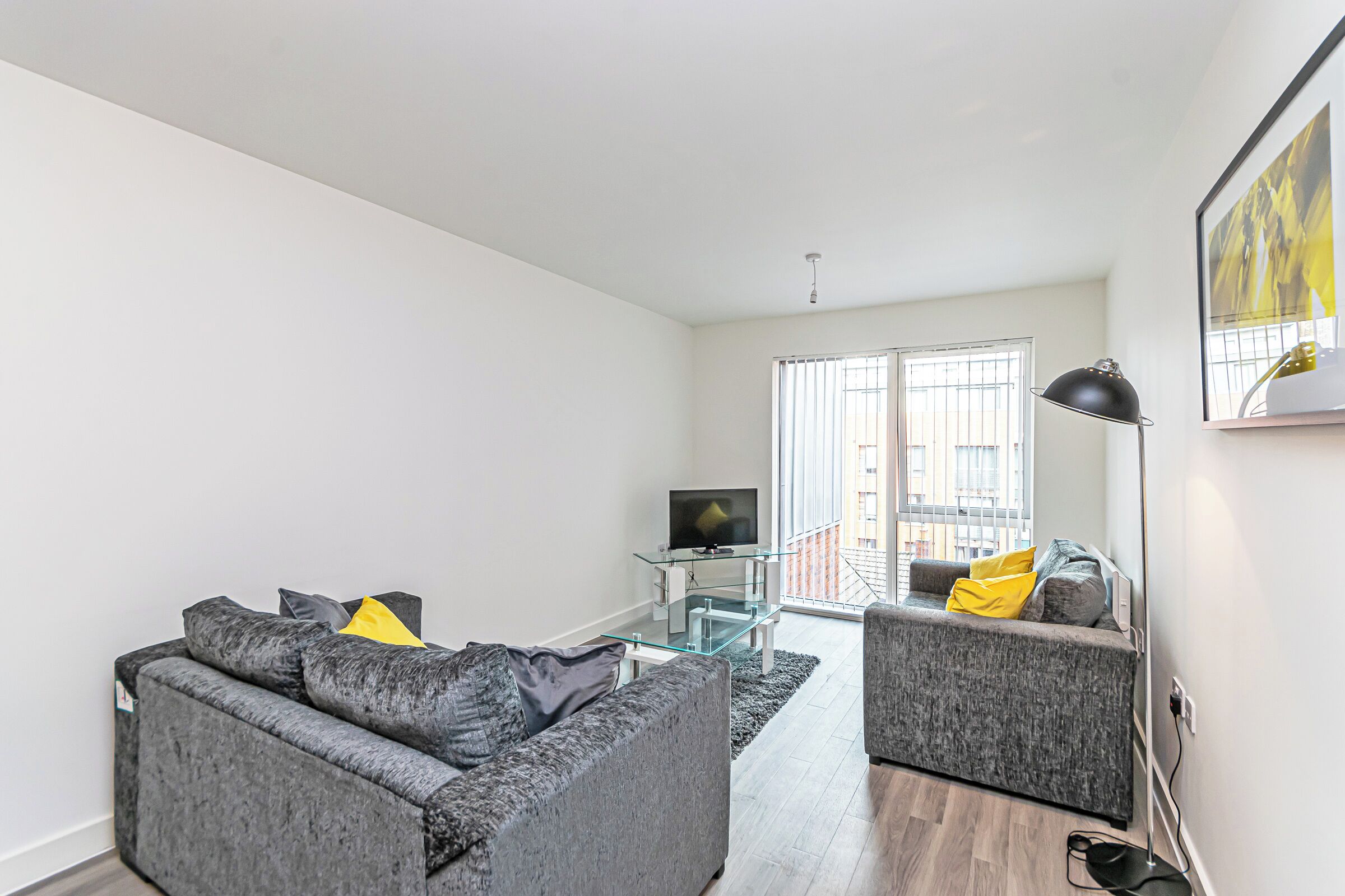 Standard Apartment | Living area | 32-inch Smart TV with digital channels