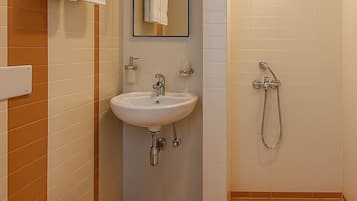 Shower, towels, soap, shampoo