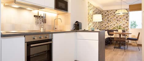 Apartment (1 Bedroom) | Private kitchen | Fridge, microwave, dishwasher, highchair